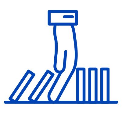 Hand stopping dominos from falling