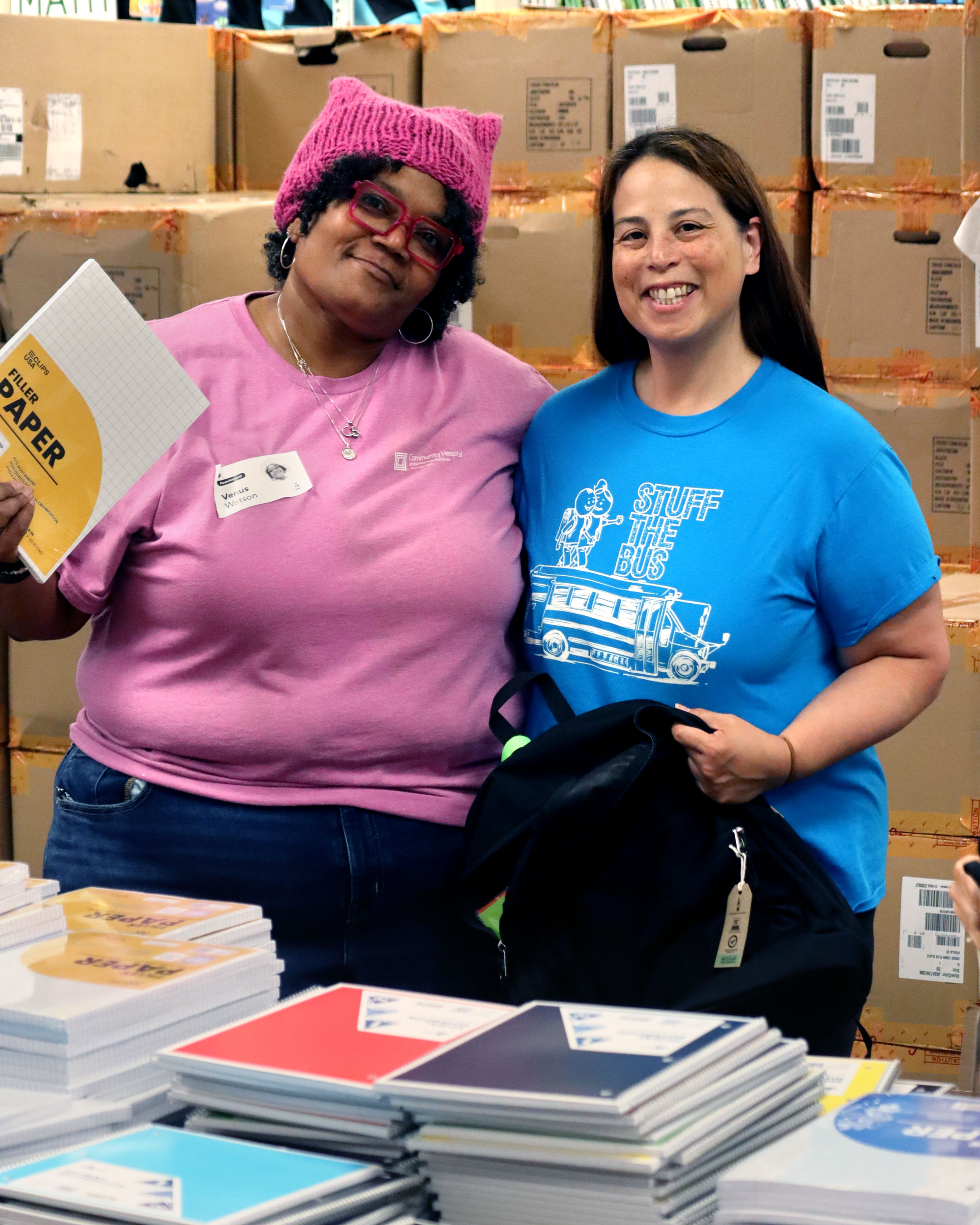 Two Montage employees at Stuff the Bus week.
